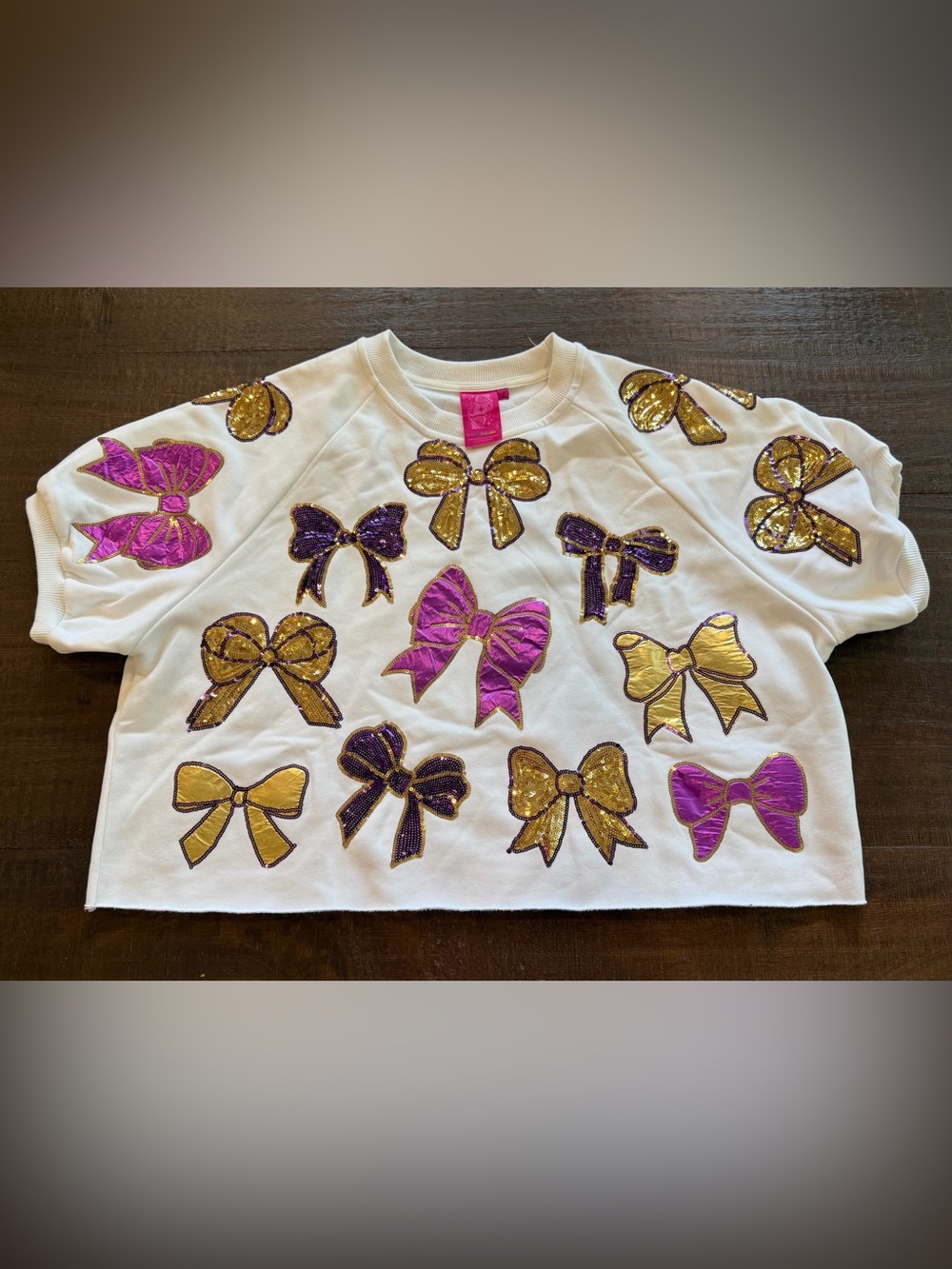 NWOT QUEEN OF SPARKLES White Sweatshirt with Gold & Purple Sequin Bows